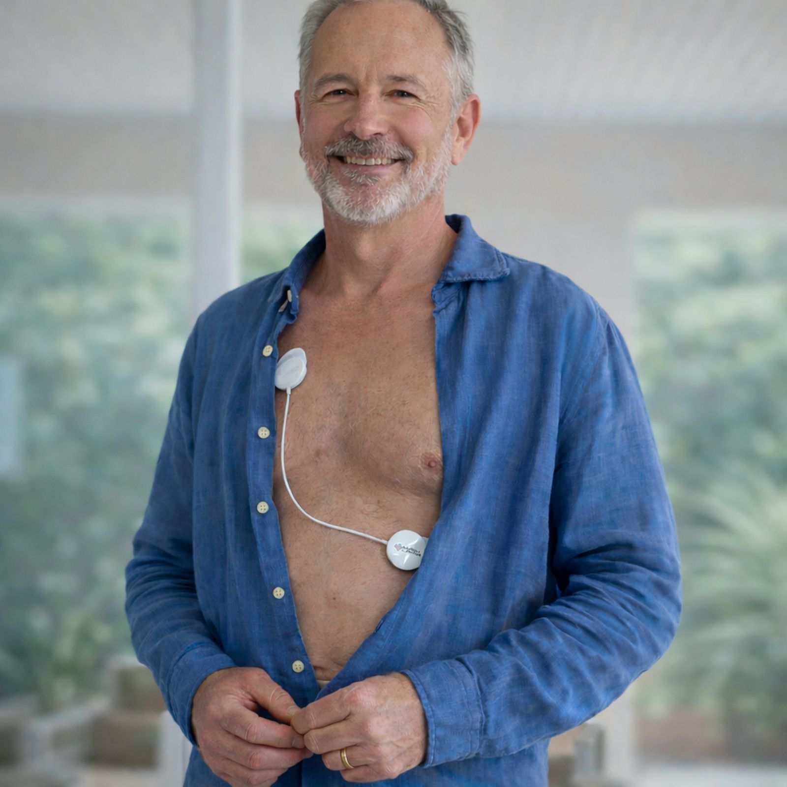 Patient wearing a lightweight cardiac monitor